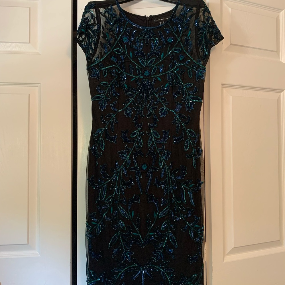 Black cocktail dress with teal beading - worn once.